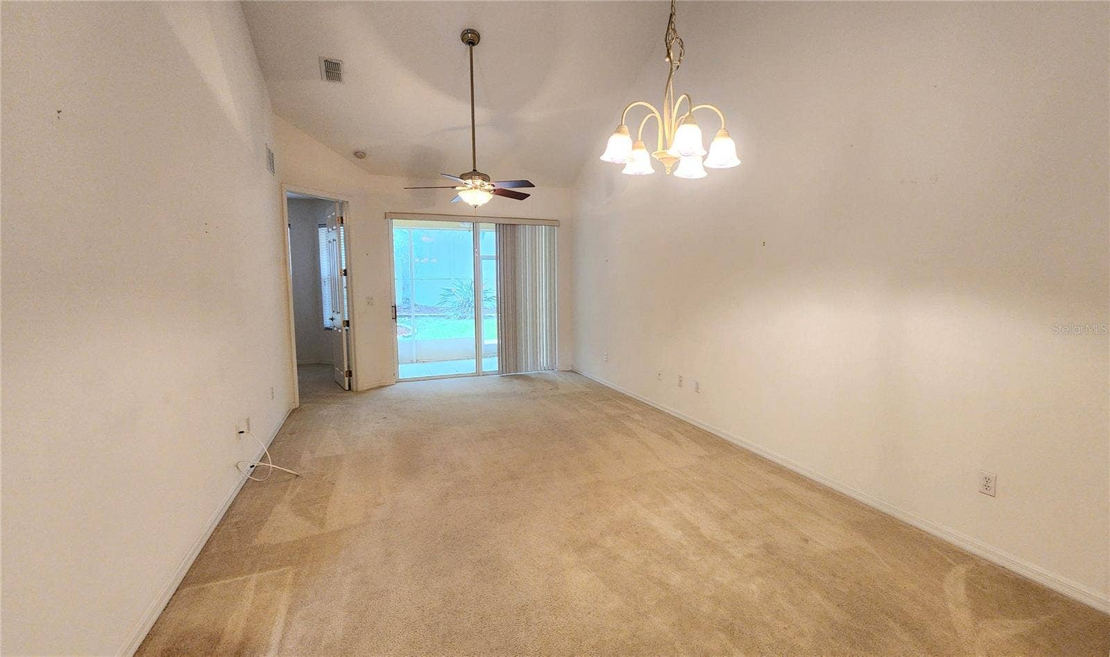 642 SPRING LAKE CIRCLE, Tarpon Springs, FL 34688 View from the Kitchen towards Patio.