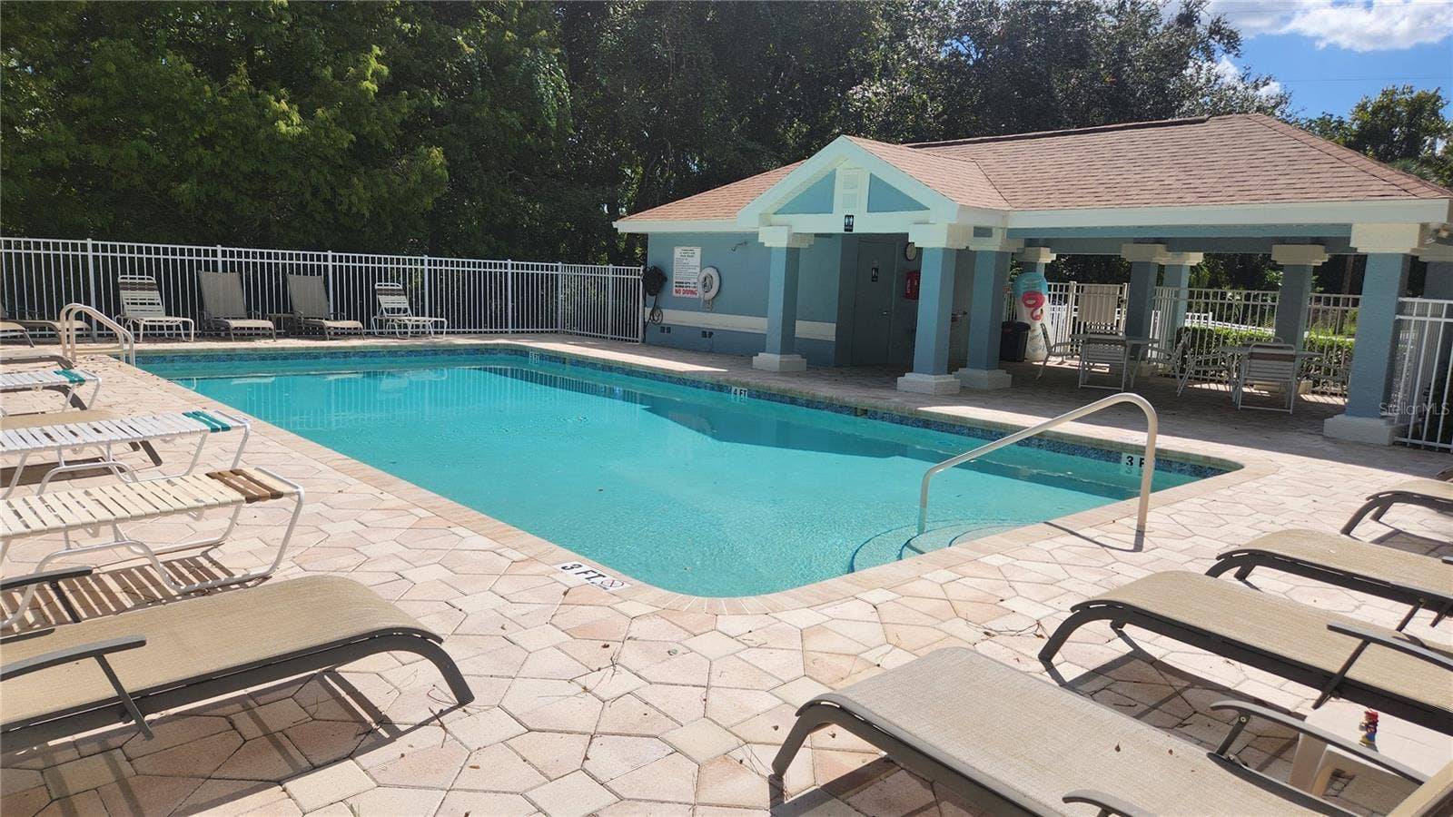 642 SPRING LAKE CIRCLE, Tarpon Springs, FL 34688 View of pool from lake.