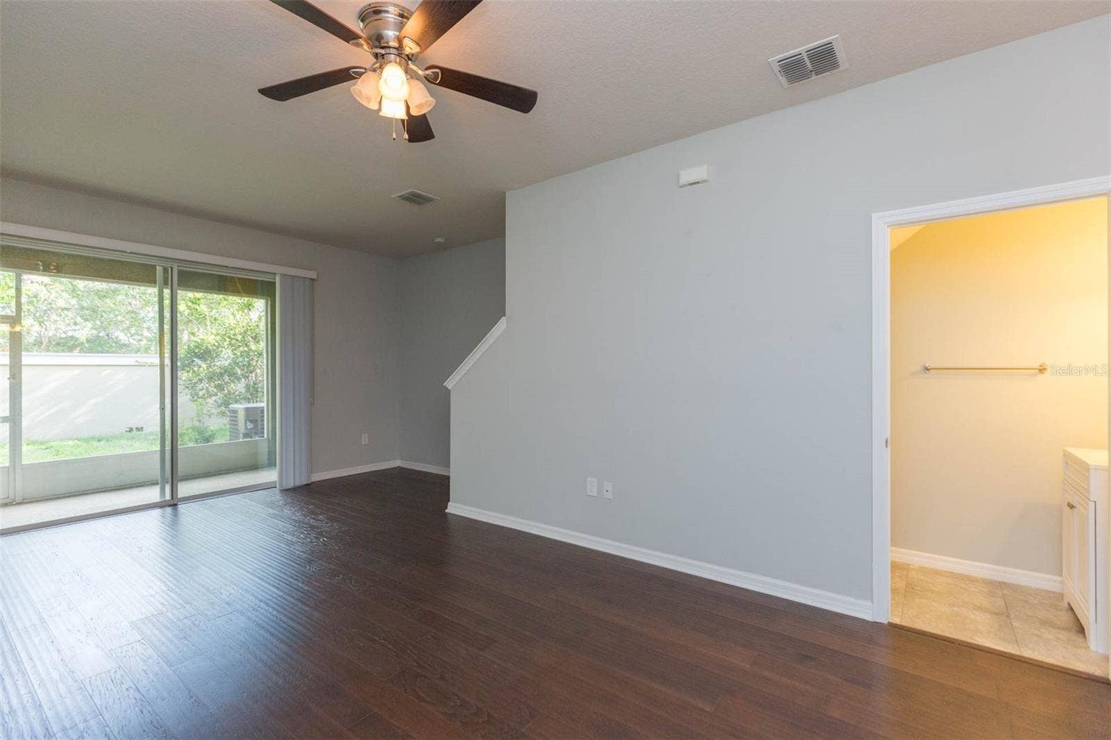 2208 LENNOX DALE LANE, Brandon, FL 33510 living room with view of half bath