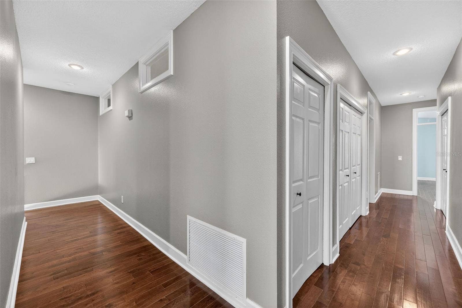 348 LARBOARD WAY, Clearwater, FL 33767 Upstairs hallway showing split bedrooms