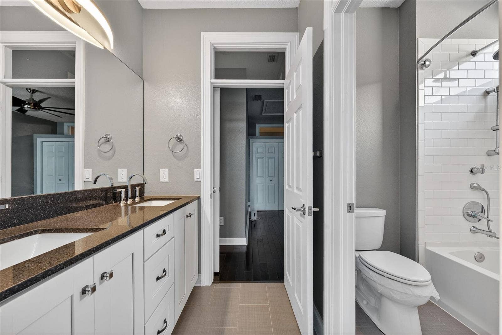 348 LARBOARD WAY, Clearwater, FL 33767 Bathroom 2- dual vanities and tub shower combo
