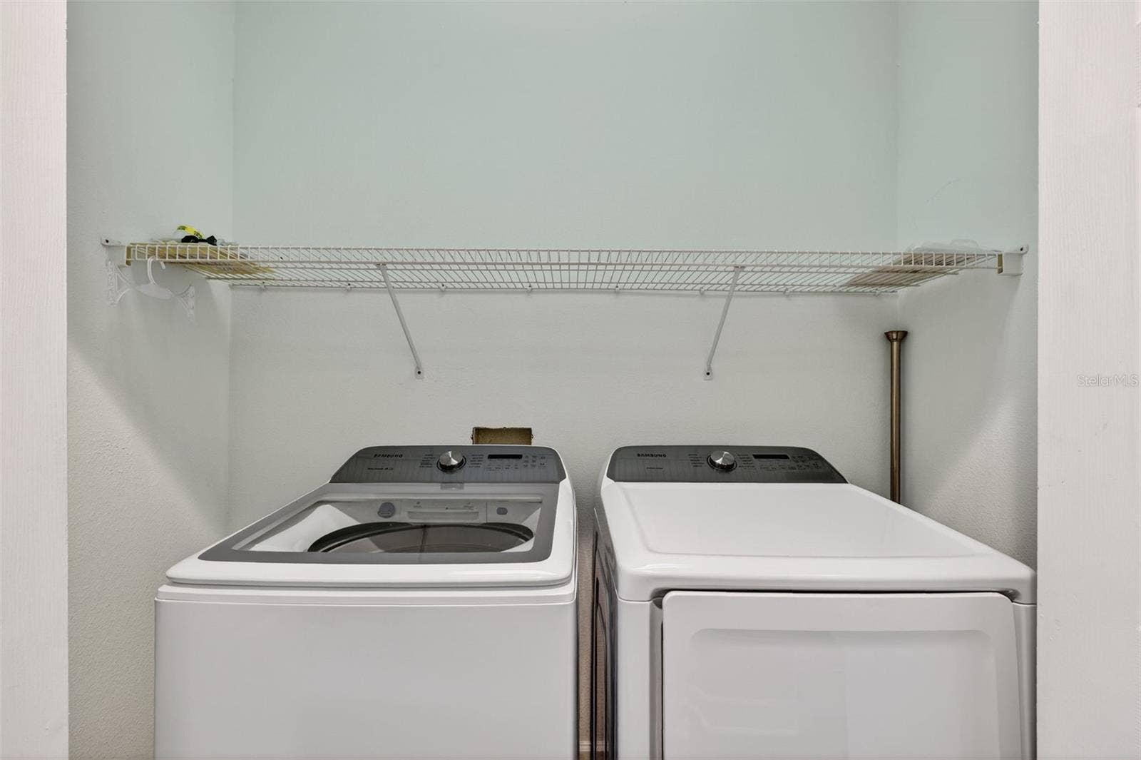 348 LARBOARD WAY, Clearwater, FL 33767 Inside Laundry on 2nd Floor with storage