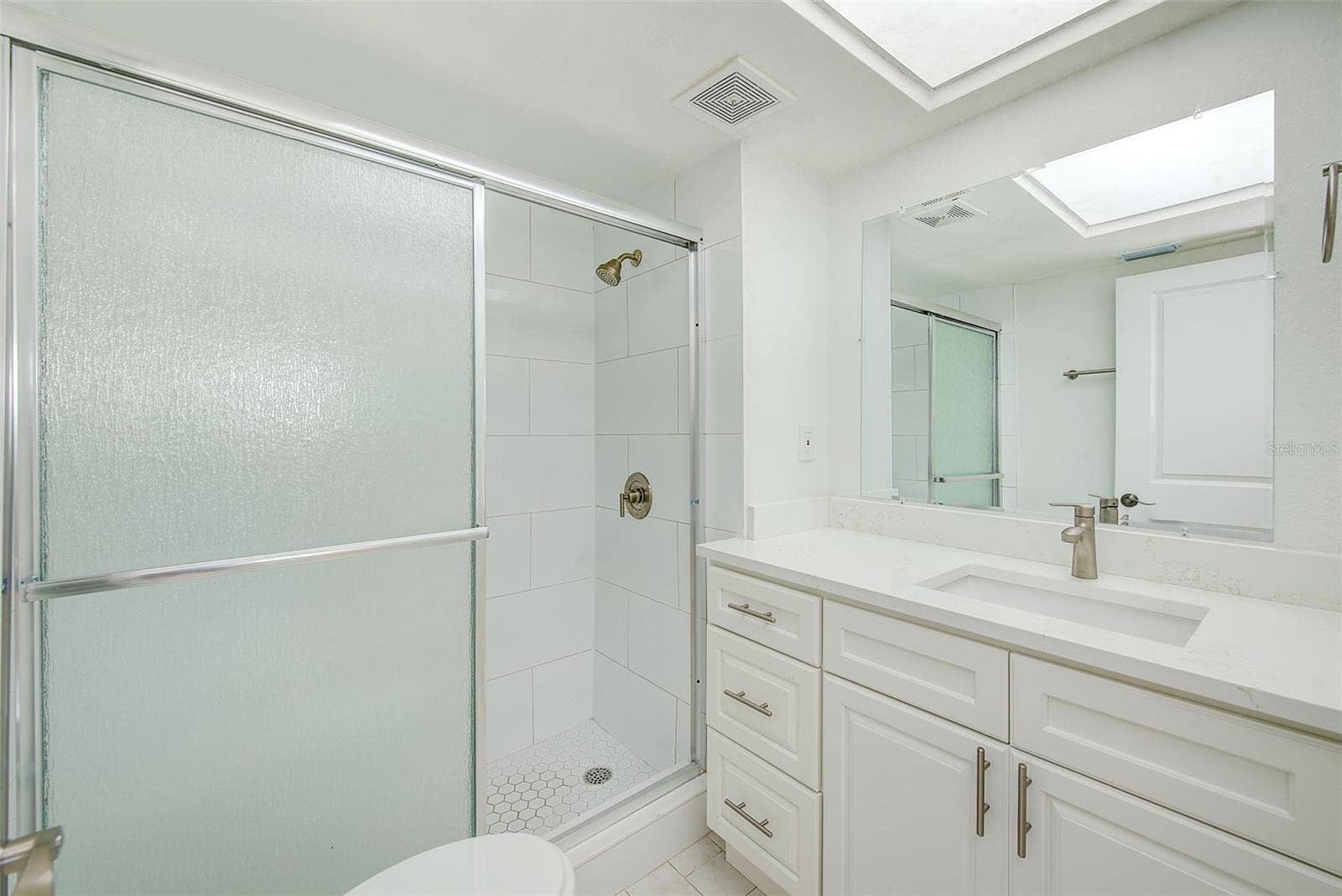 6201 2ND STREET E, #74, St Pete Beach, FL 33706 Bath has a Walk in Shower