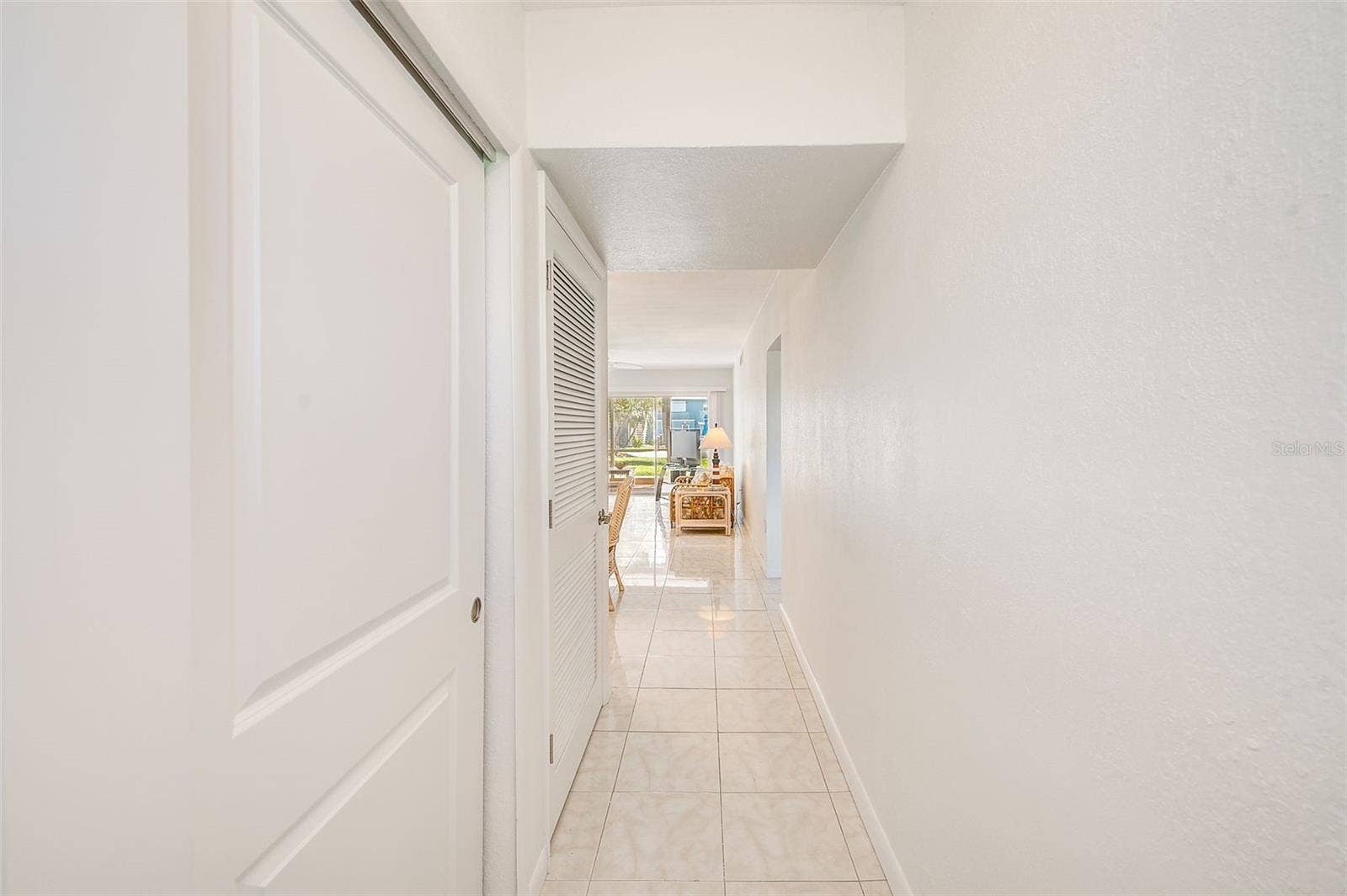 6201 2ND STREET E, #74, St Pete Beach, FL 33706 Front Hallway has two closets