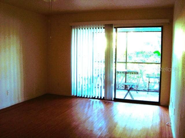 11485 OAKHURST ROAD, #A106, Largo, FL 33774 MASTER BEDROOM WITH SLIDERS