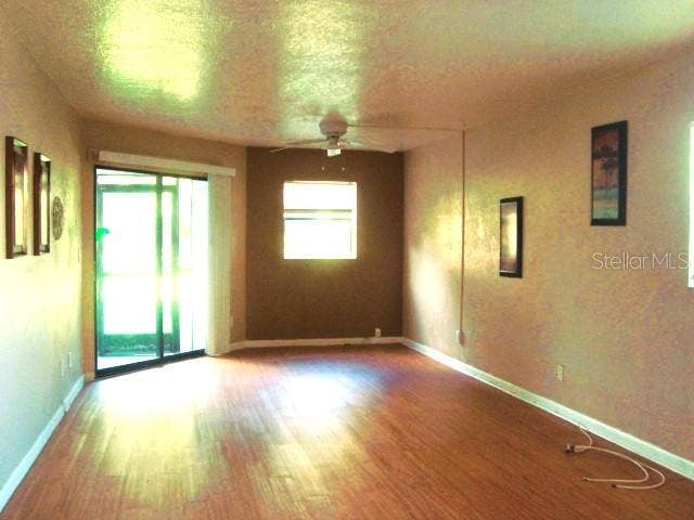 11485 OAKHURST ROAD, #A106, Largo, FL 33774 SLIDERS GOING OUT TO THE SCREENED PORCH