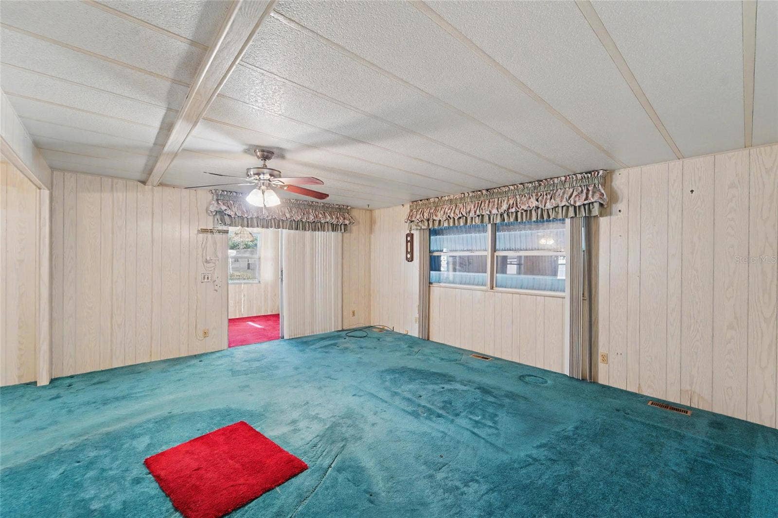 Living room opens to Florida room