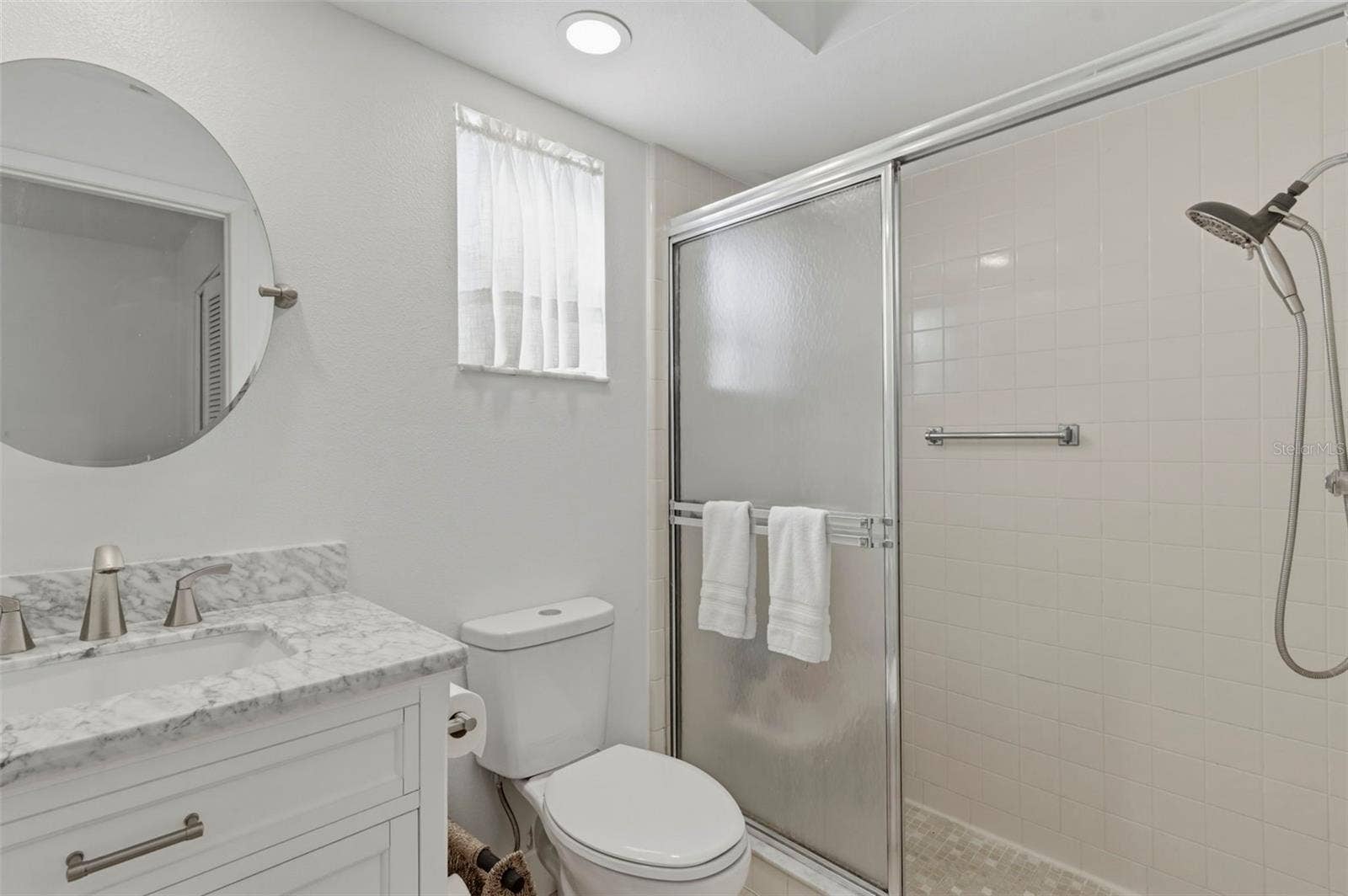 Primary bath shower, new vanity etc.