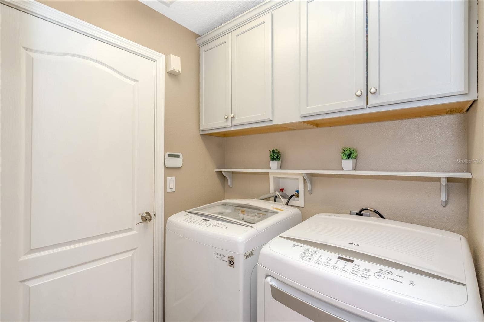 12539 MOUNTAIN SPRINGS PLACE, New Port Richey, FL 34655 Laundry Room