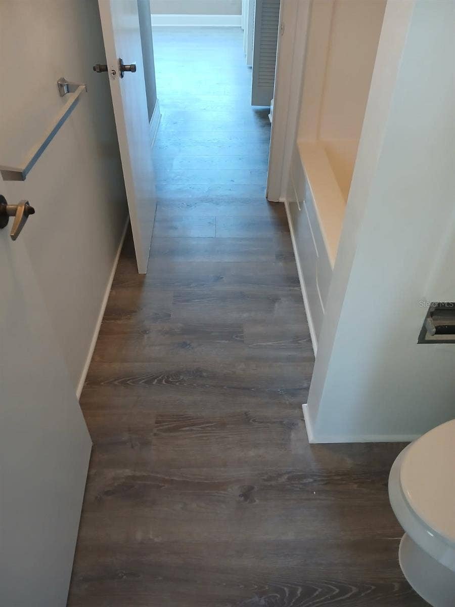 8719 COVE COURT, #10, Tampa, FL 33615 Upper-floor new flooring