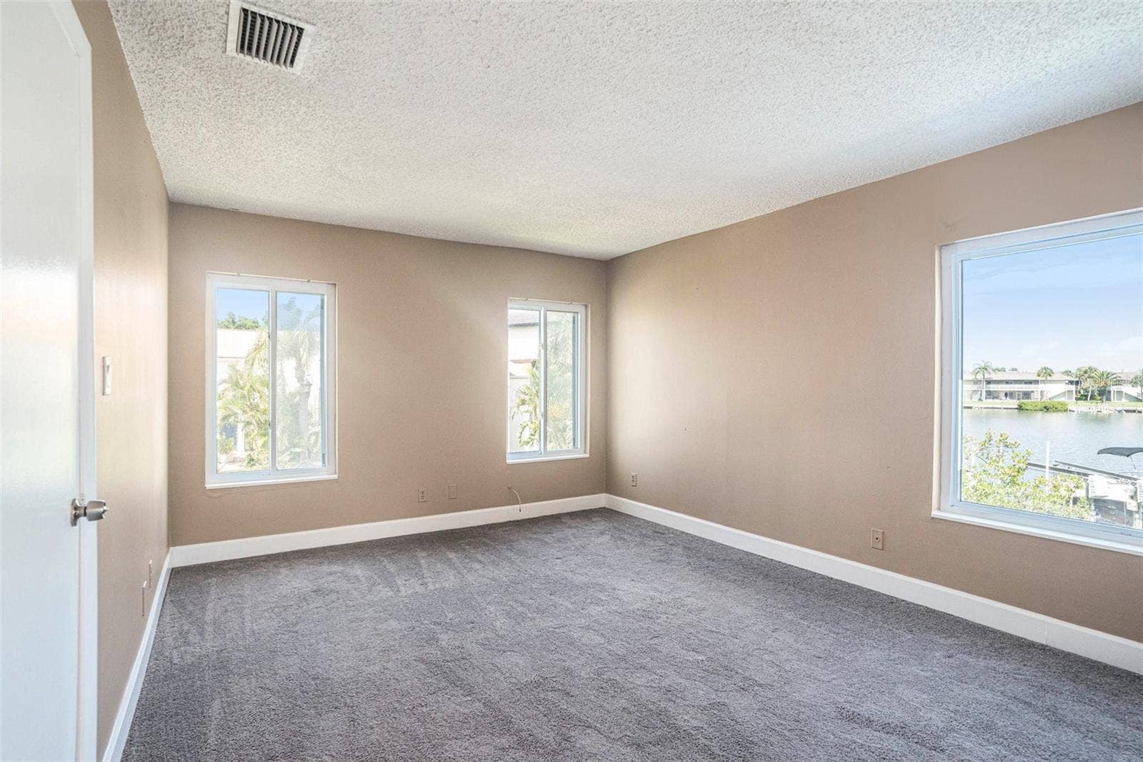 8719 COVE COURT, #10, Tampa, FL 33615 Water views. Carpet has been replaced with LVP