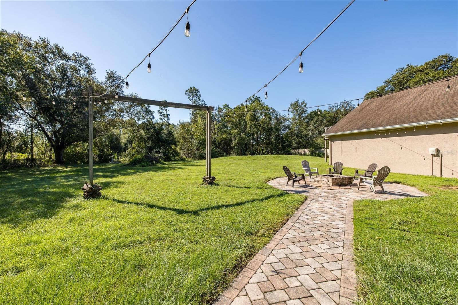 31524 CROSS CREEK LANE, Wesley Chapel, FL 33543 Back yard and fire pit