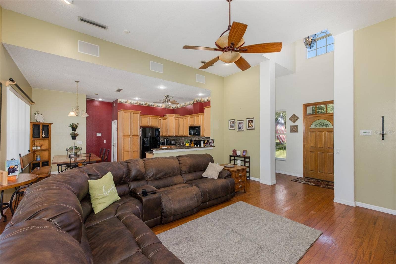 31524 CROSS CREEK LANE, Wesley Chapel, FL 33543 Living room overlooking kitchen