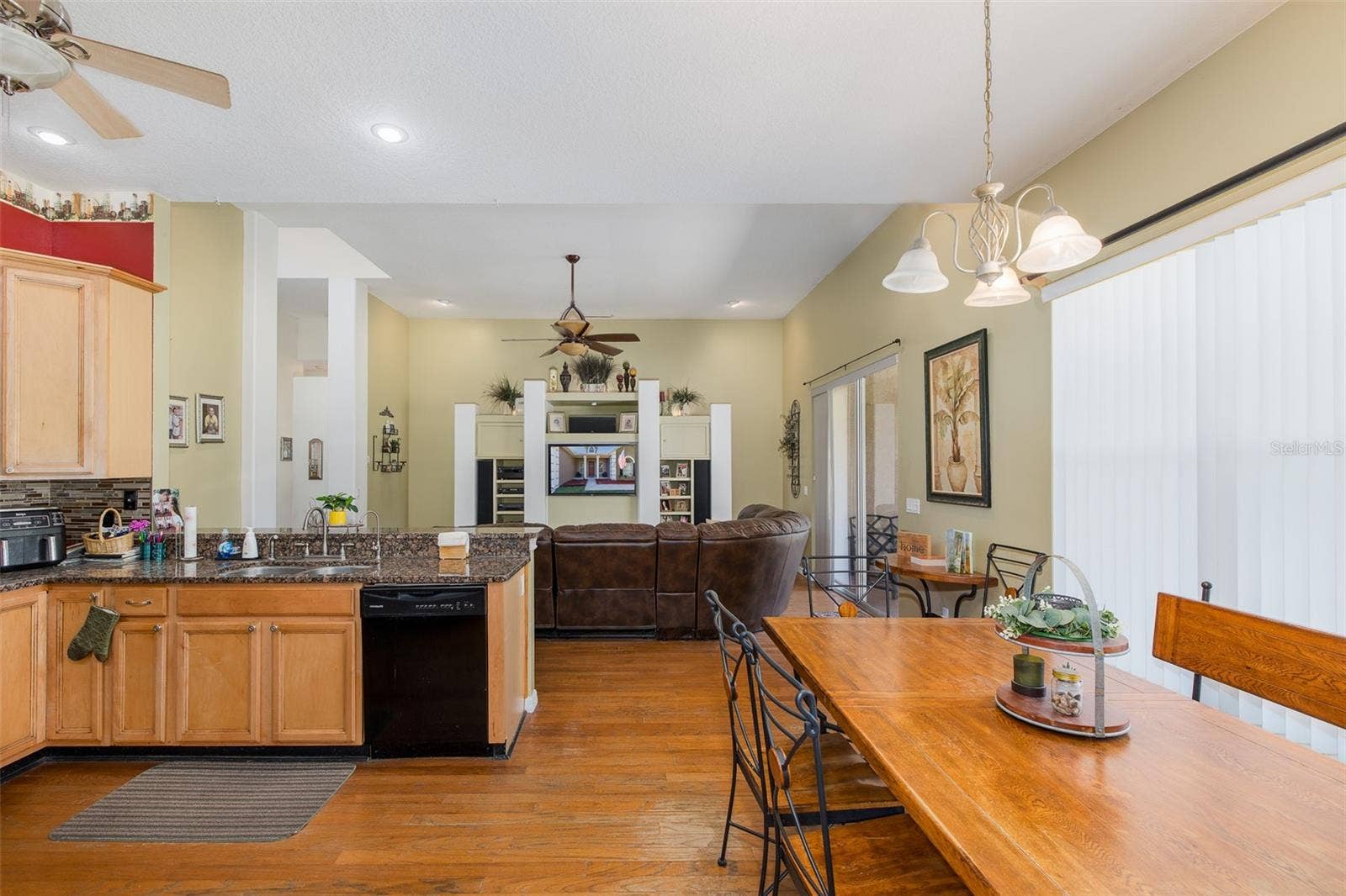 31524 CROSS CREEK LANE, Wesley Chapel, FL 33543 Kitchen overlooking living room