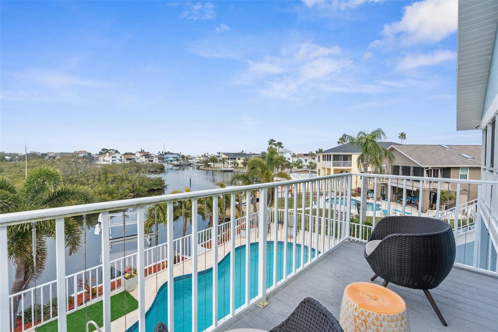 6029 BAYWAY COURT, New Port Richey, FL 34652 Back exposure deck off Owners Suite. Located on second story.