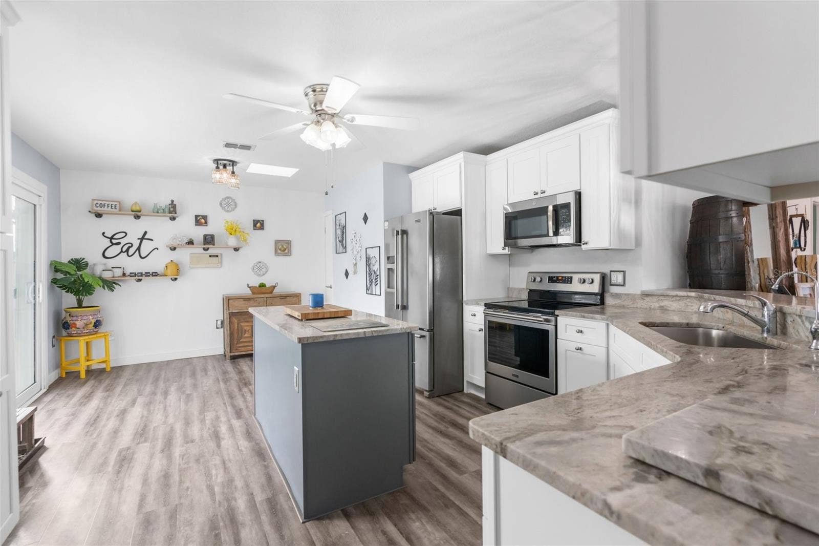 6029 BAYWAY COURT, New Port Richey, FL 34652 Kitchen. Located on second story.