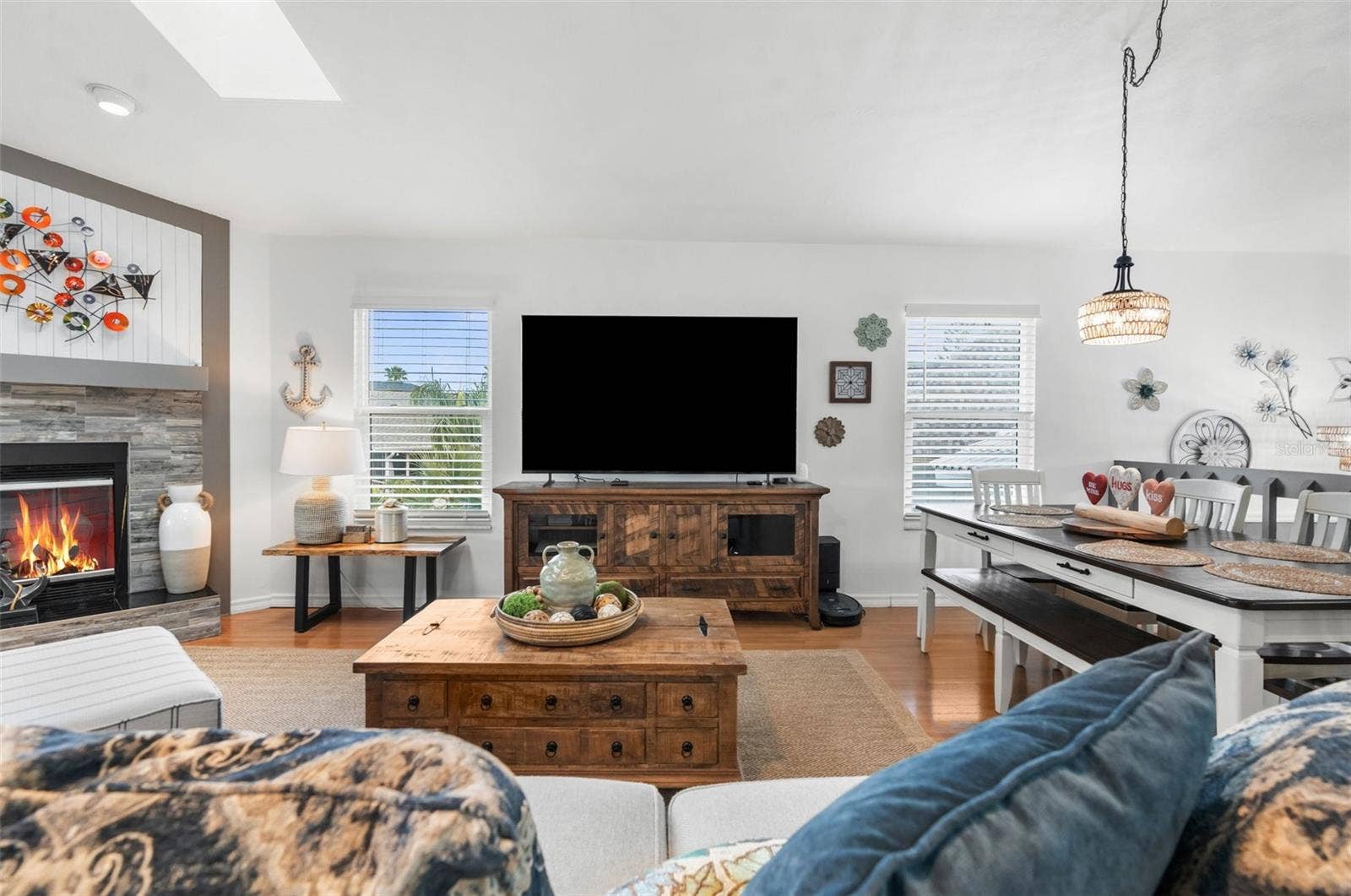 6029 BAYWAY COURT, New Port Richey, FL 34652 Family Room/Dining Room with fireplace. Located on second story.