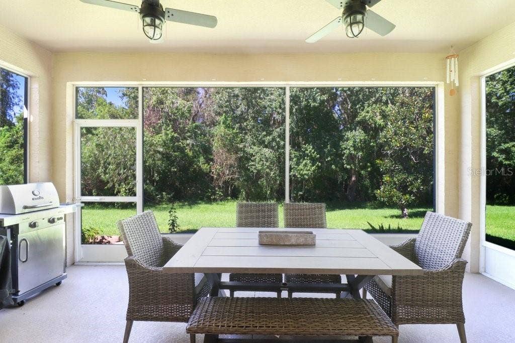 Screened rear porch with view to conservation