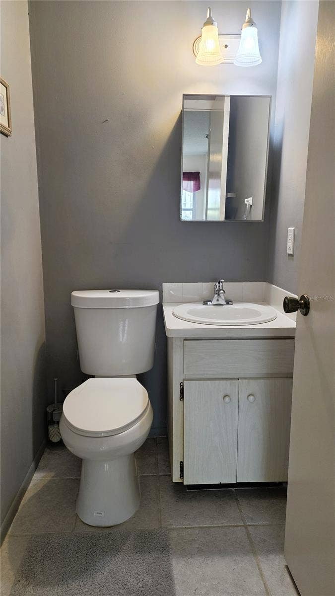 4319 TAHITIAN GARDENS CIRCLE, #A, Holiday, FL 34691 Half Bath in Primary Bedroom