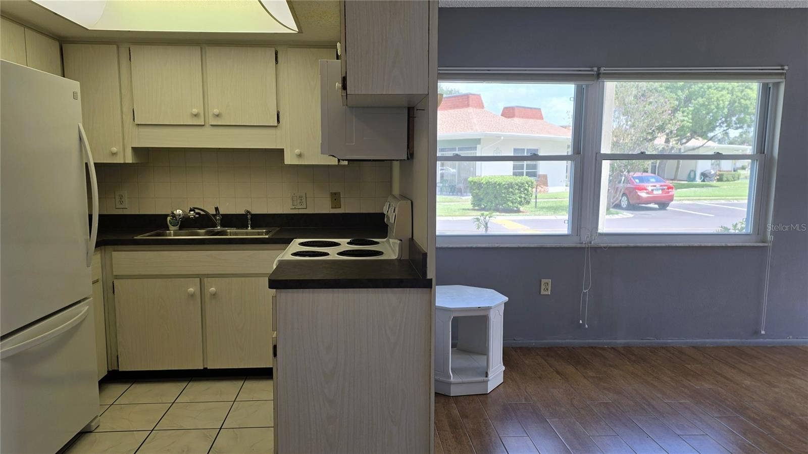 4319 TAHITIAN GARDENS CIRCLE, #A, Holiday, FL 34691 Kitchen and Living Room