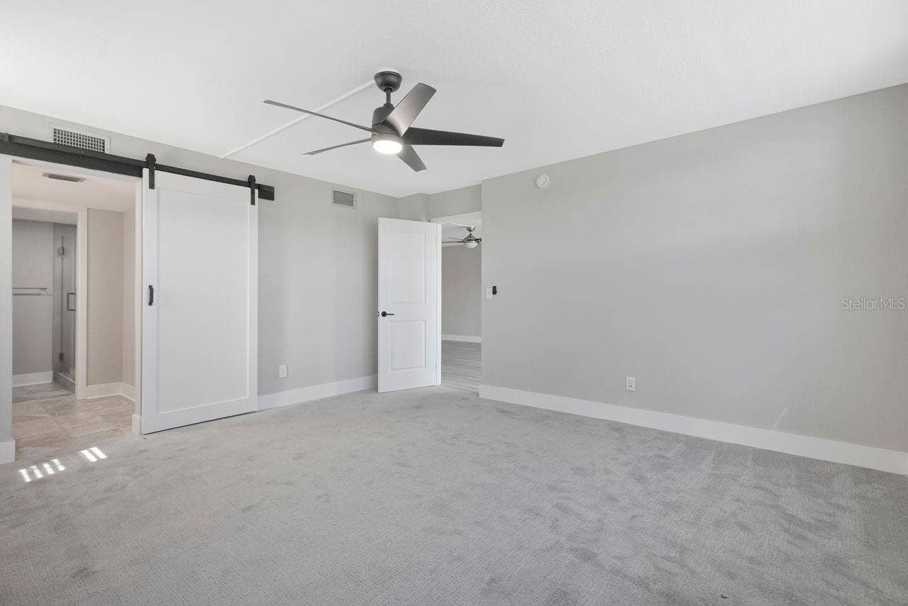 7645 SUN ISLAND DRIVE S, #101, South Pasadena, FL 33707 Primary bedroom