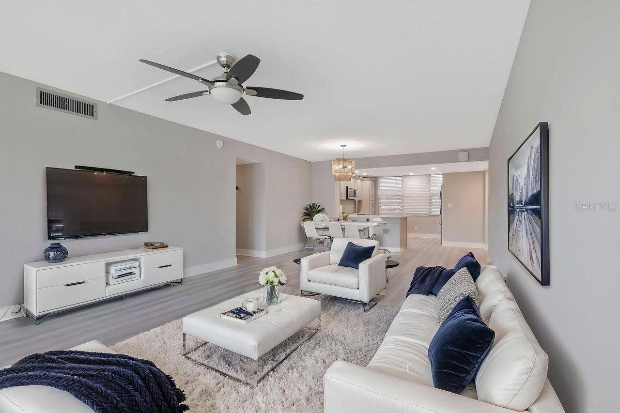 7645 SUN ISLAND DRIVE S, #101, South Pasadena, FL 33707 Virtual staged living/dining