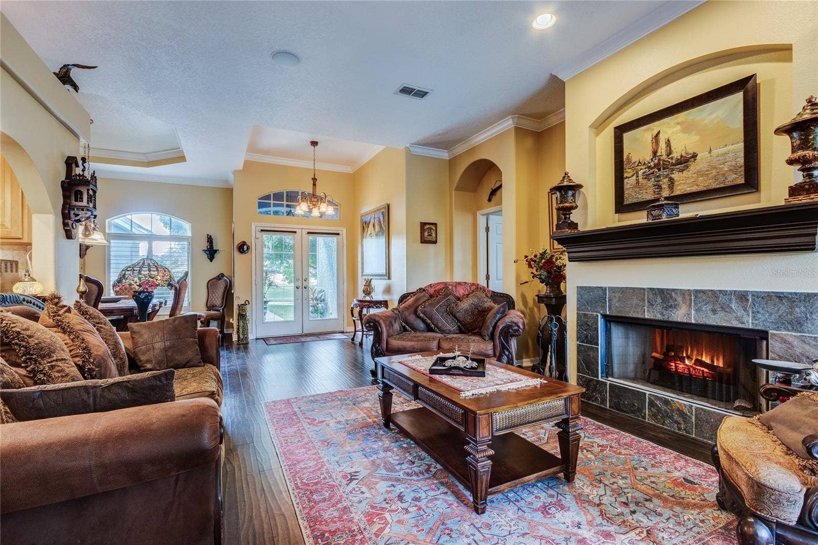 Formal Living and Dining areas are at the front of the home