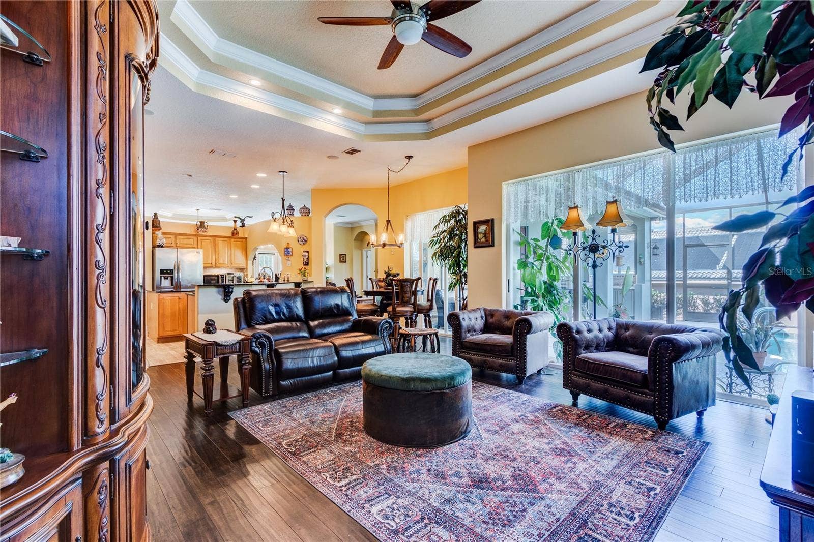 Great room is OPEN to the kitchen with sliding doors to the Lanai boasting Expansive Golf Course views