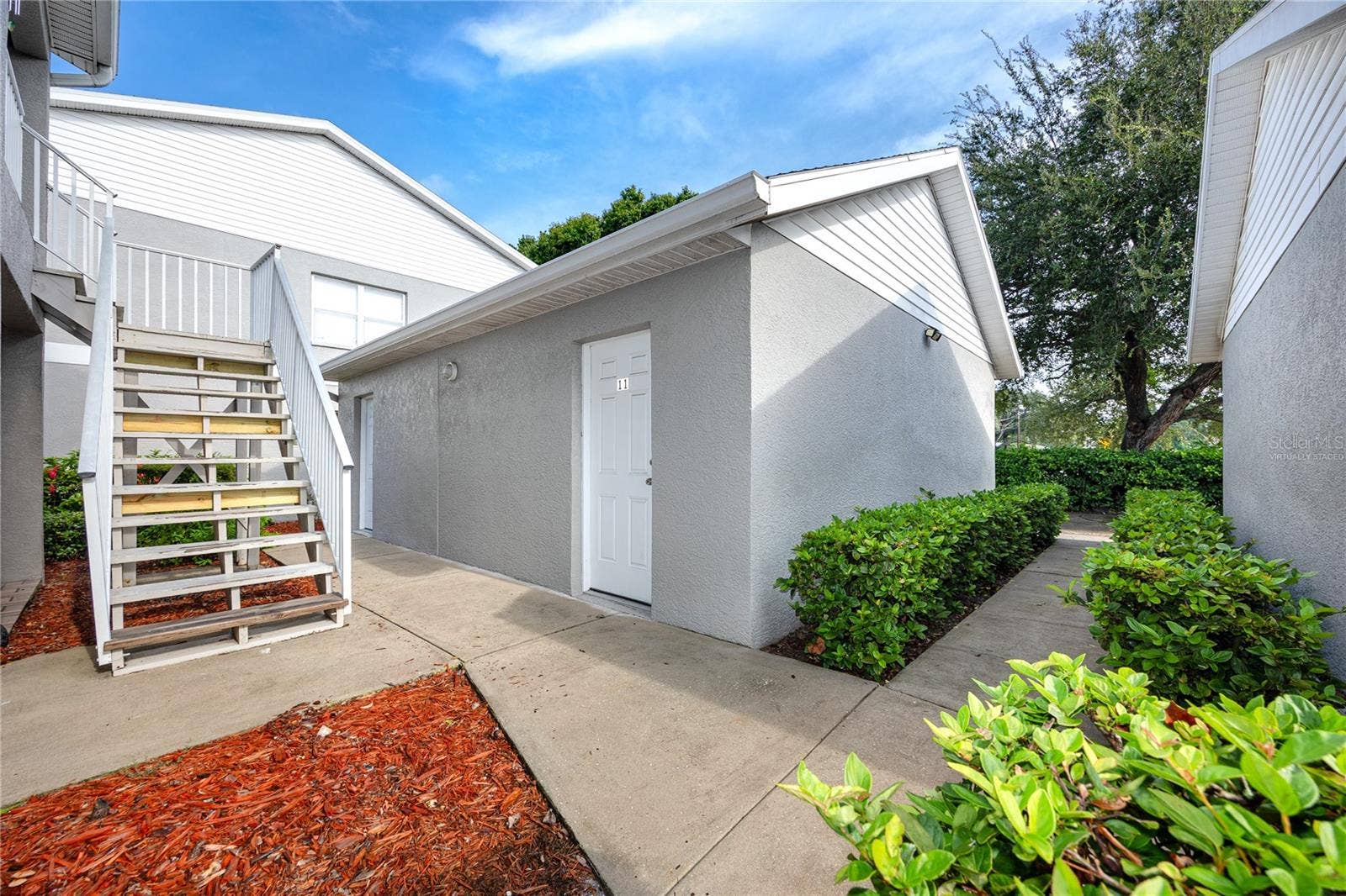 14460 MARINA WAY, #11, Seminole, FL 33776 Virtually Staged * Screened/Glass enclosed Lanai
