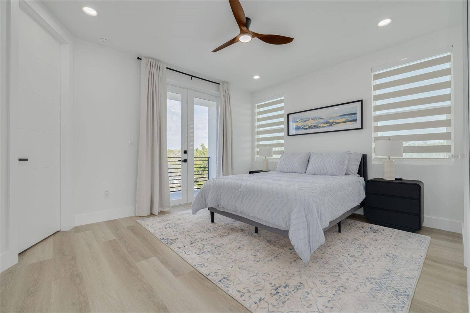 7609 DEEDRA CIRCLE, Port Richey, FL 34668 Second Bedroom with ensuite and balcony.