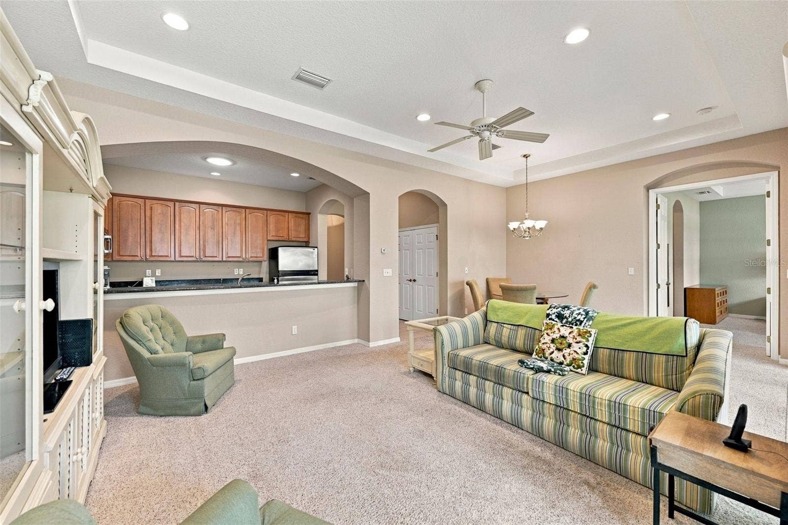 2418 KENSINGTON GREENS DRIVE, #9, Sun City Center, FL 33573 Looking into the Living Room/Kitchen