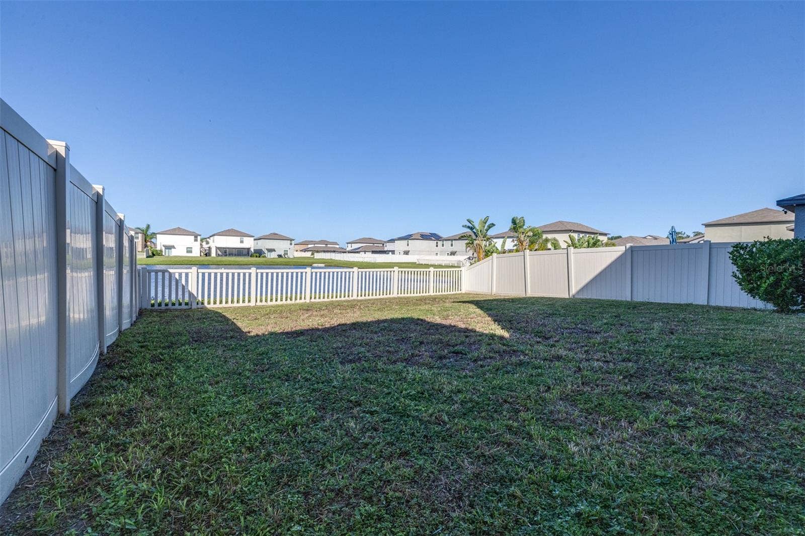 16755 DELIA STREET, Wimauma, FL 33598 Fully Fenced yard overlooking pond