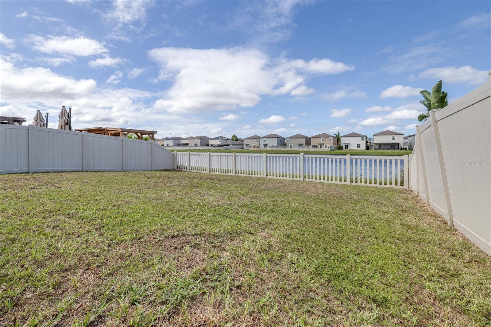 16755 DELIA STREET, Wimauma, FL 33598 Fully Fenced yard overlooking pond