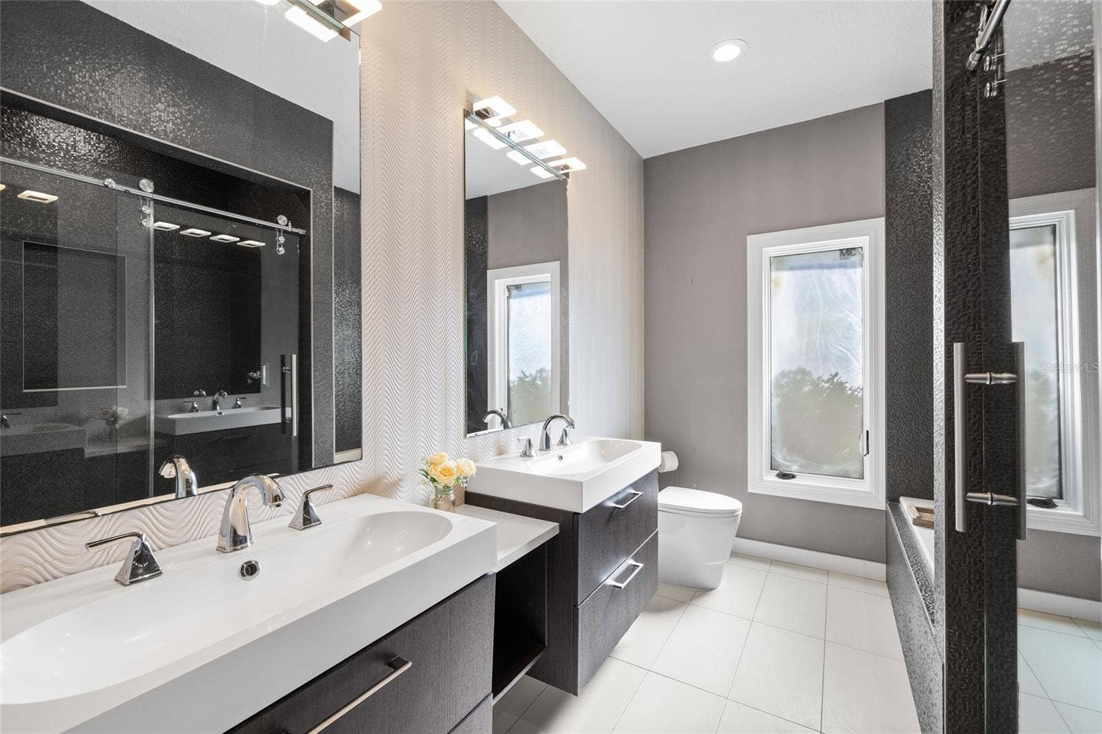 9805 COMPASS POINT WAY, Tampa, FL 33615 Bathroom 3 with dual vanities, tub and separate shower
