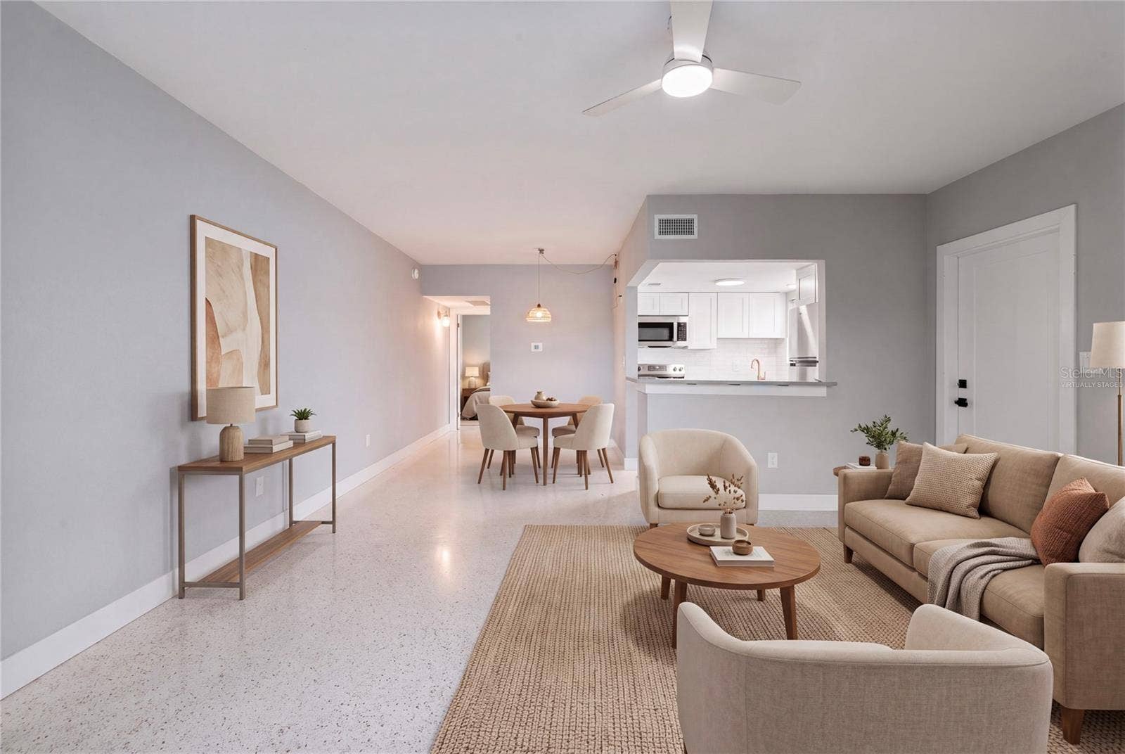 11355 3RD STREET E, #2, Treasure Island, FL 33706 Virtually Staged, living area/dining room