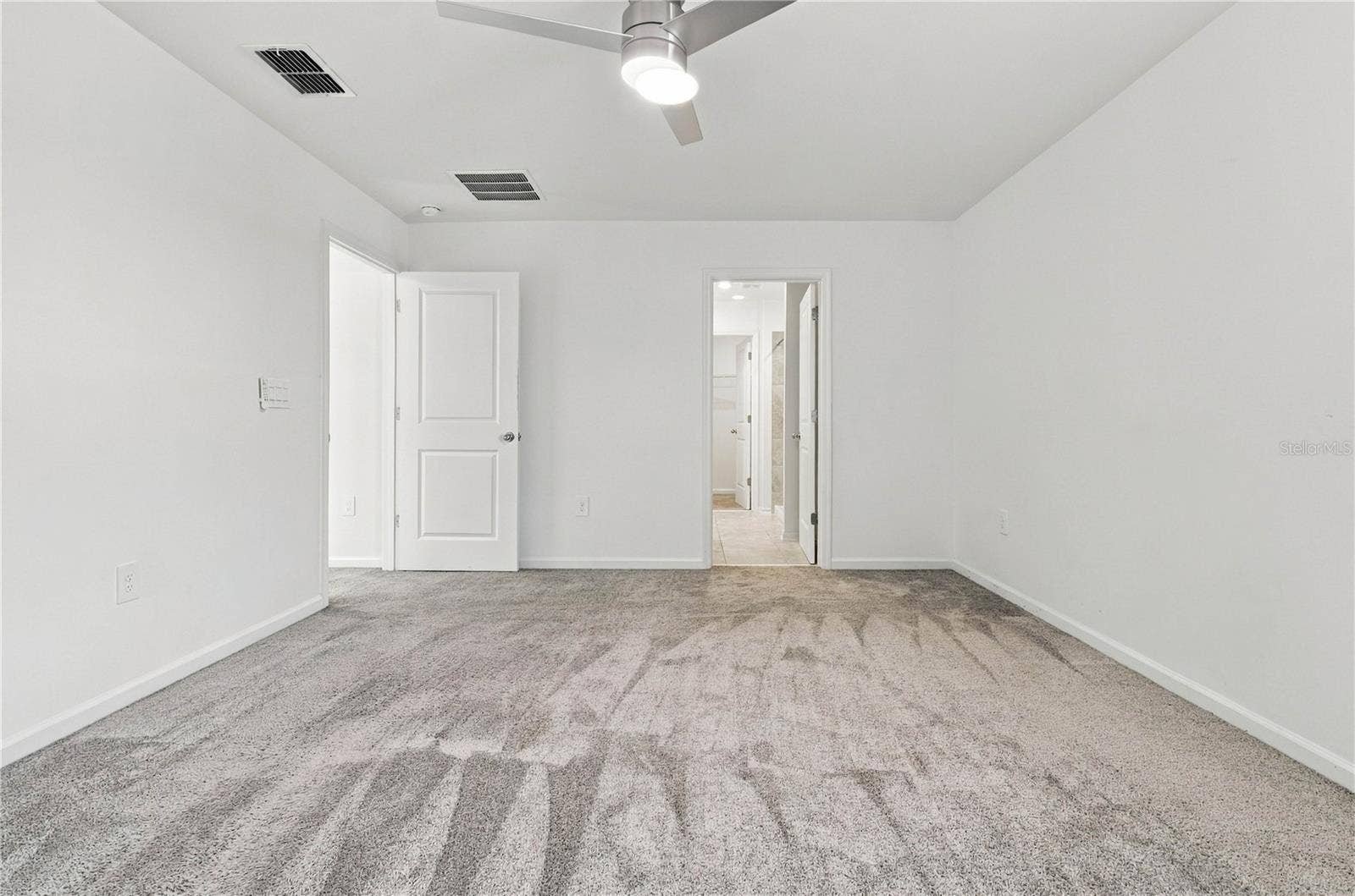 997 HAROLD PASS, Winter Haven, FL 33884 Primary Bedroom with En-Suite Access