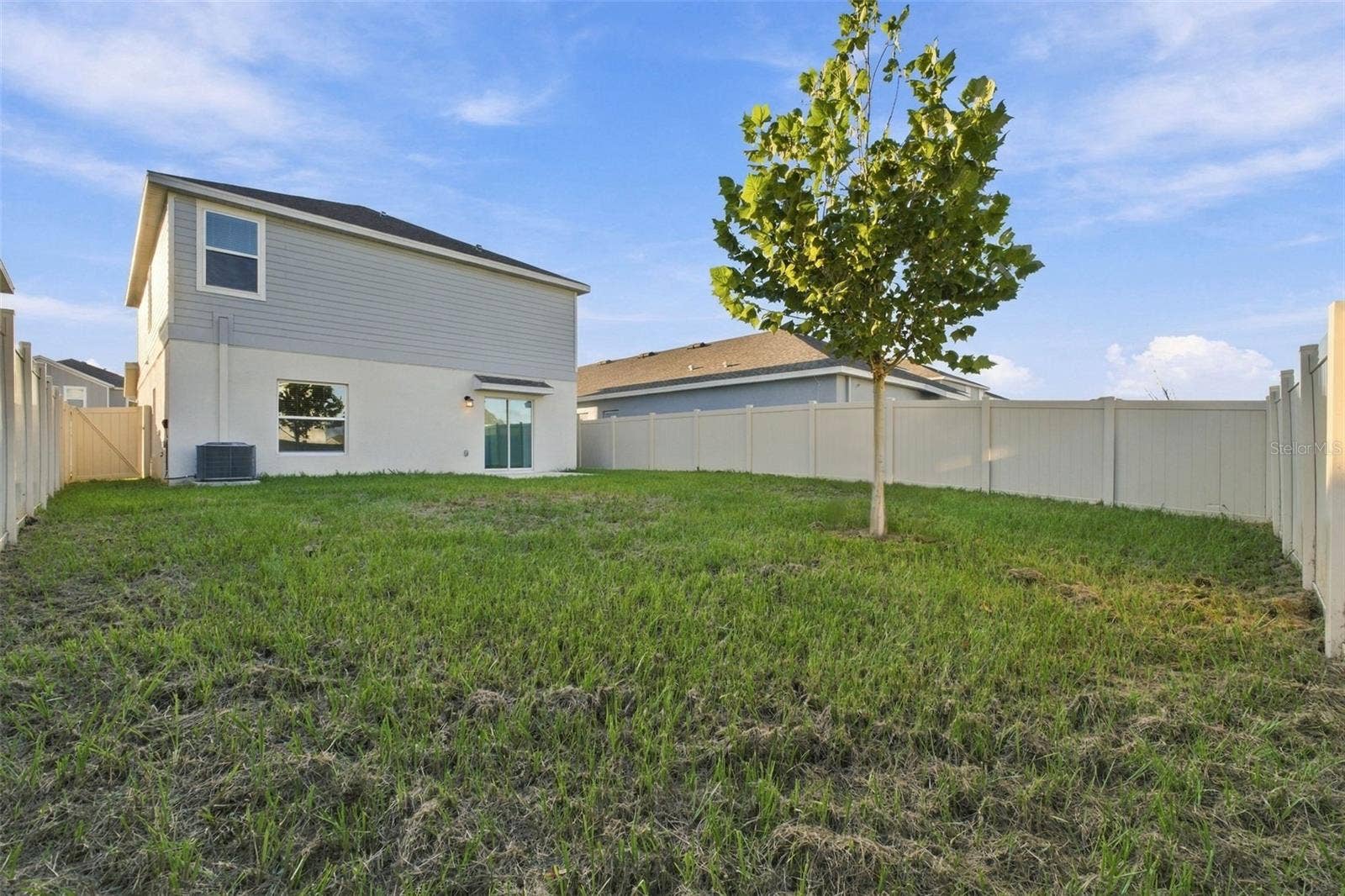 997 HAROLD PASS, Winter Haven, FL 33884 Rear Exterior with Fenced Backyard