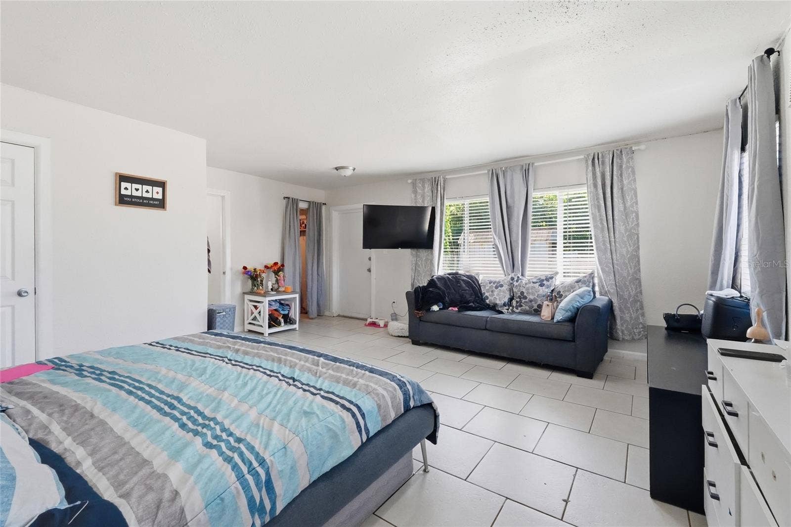 Primary bedroom 2420 with 1/2 bath and laundry