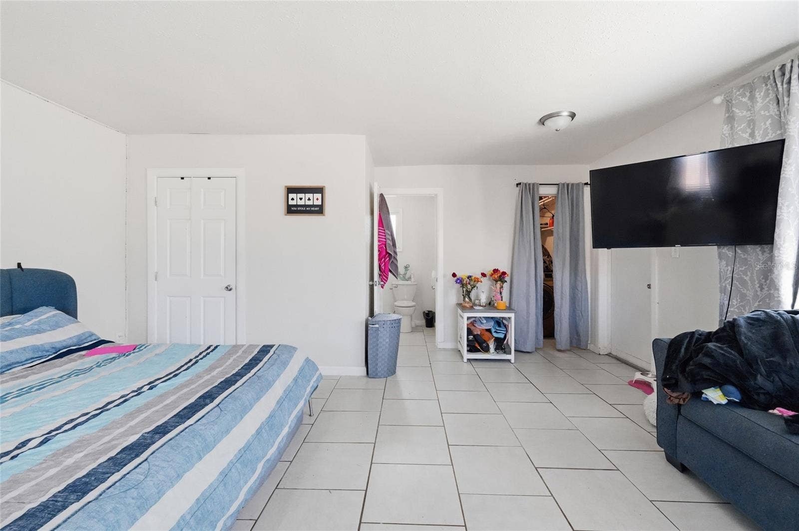 Primary bedroom 2420 with 1/2 bath and laundry