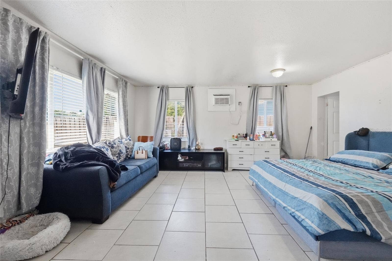 Primary bedroom 2420 with 1/2 bath and laundry