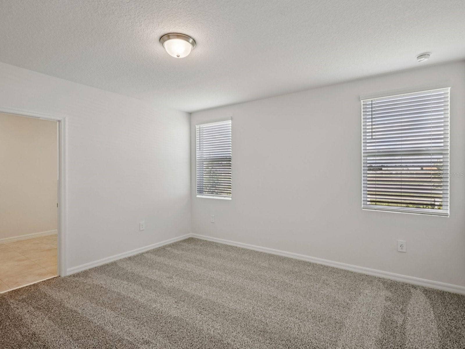3965 GIORGIO DRIVE, Winter Haven, FL 33884 Can you make this description for VillaMar for MLS with a warm but sales appeal: This versatile floorplan offers four bedrooms, two full baths and family room, complemented by an open-concept kitchen, dining area, and great room designed for gathering and entertaining.