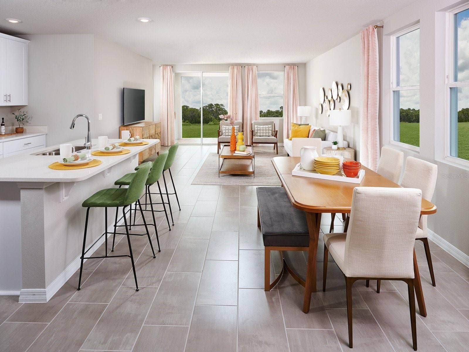 13823 OWEN PRESERVE RUN, Parrish, FL 34219 Welcome to Salt Meadows, where comfort, style, and everyday functionality come together in a beautifully designed home. This versatile floorplan features four spacious bedrooms and two full baths, offering the flexibility today's homeowners need. The open-concept kitchen seamlessly connects to the dining area and great room, creating a warm and inviting space that's perfect for entertaining guests, hosting family gatherings, or simply enjoying day-to-day life. Thoughtfully designed with modern living in mind, this home combines spacious interiors, welcoming gathering areas, and effortless flow to create a place where lasting memories are made.
