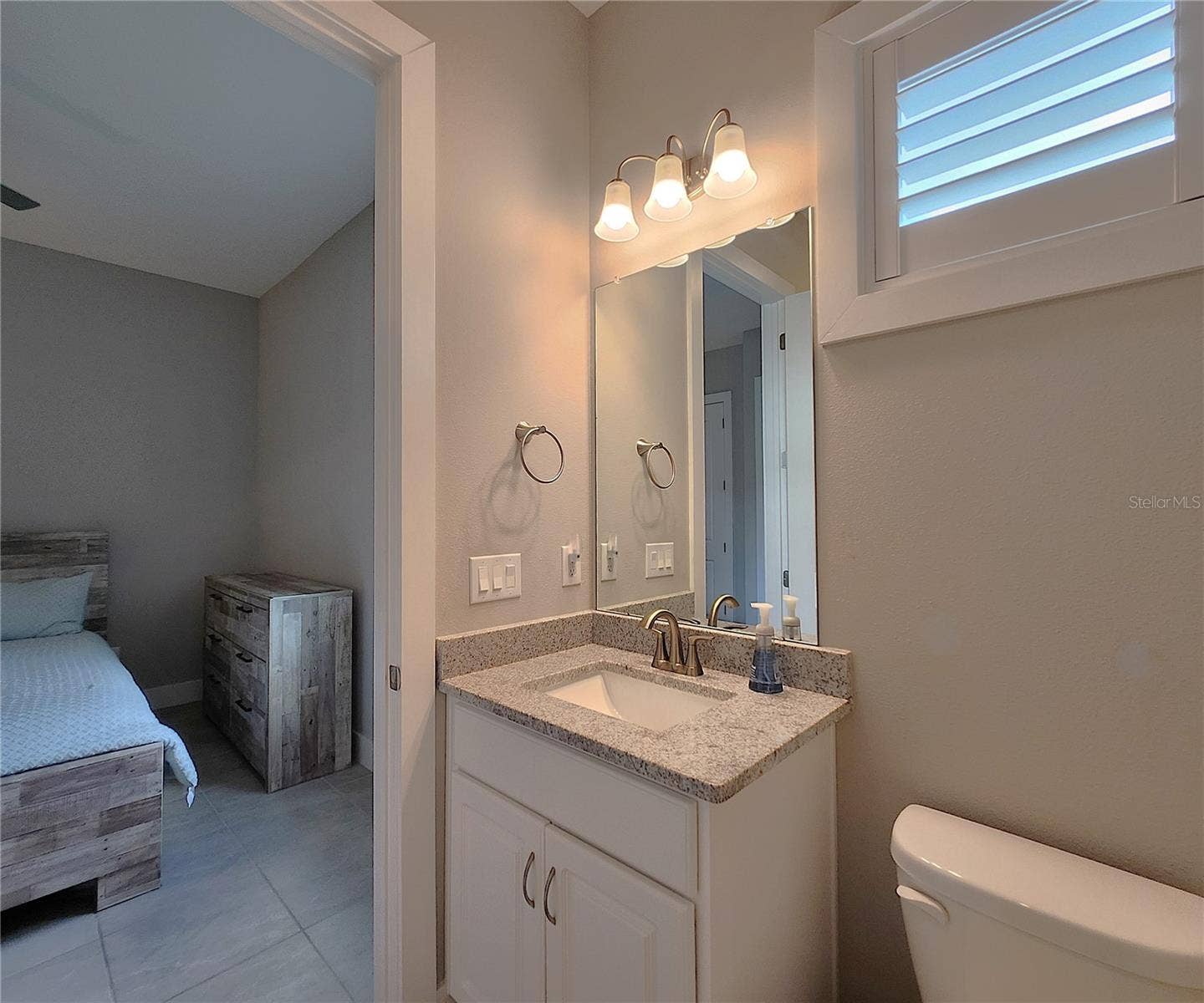 8896 DRUMMER PLANK DRIVE, Wesley Chapel, FL 33545 Jack-n-Jill Bathroom includes separate sink vanities, bathtub/shower combo