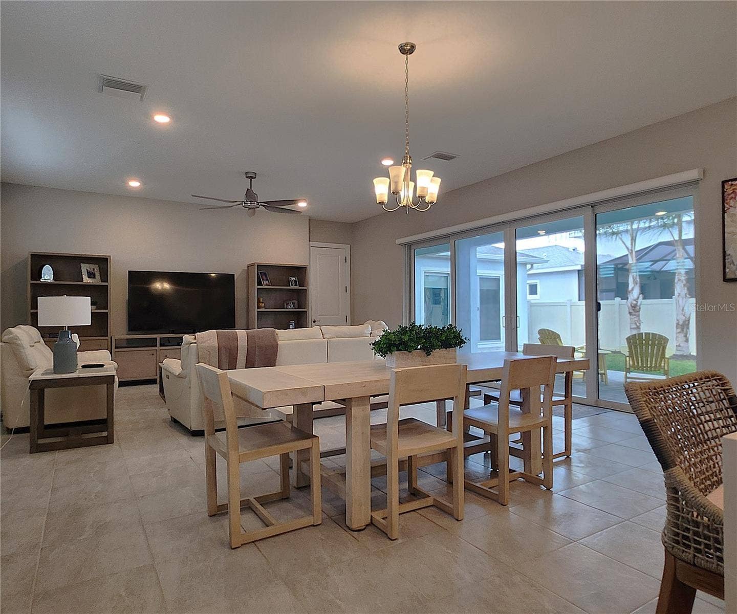 8896 DRUMMER PLANK DRIVE, Wesley Chapel, FL 33545 Main home: plantation shutters, remote controlled shade, large living room, dining area, large open kitchen, 3 bedrooms, 2 full bathrooms, 1 guest bathroom, interior laundry room