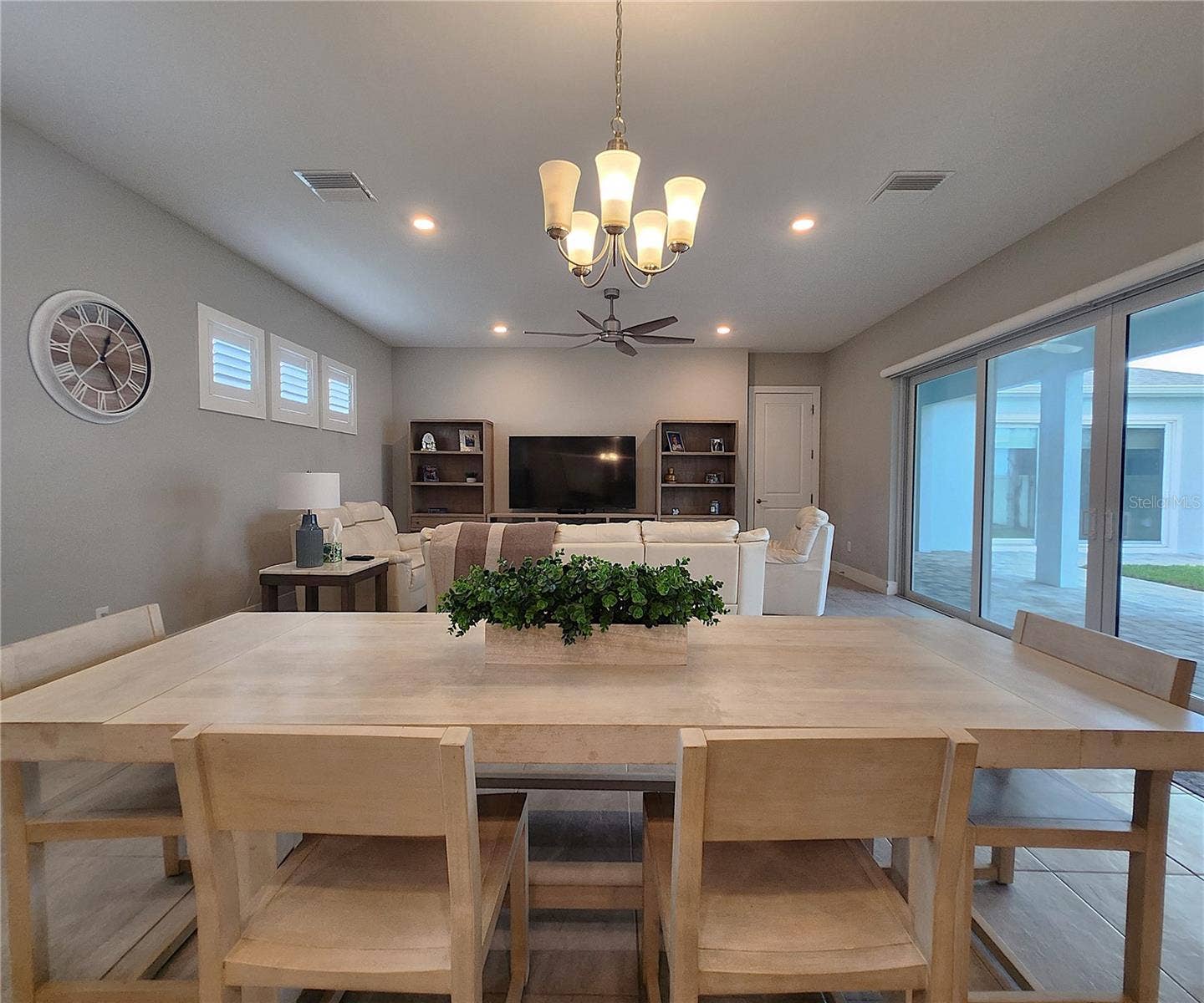 8896 DRUMMER PLANK DRIVE, Wesley Chapel, FL 33545 Main home: plantation shutters, remote controlled shade, large living room, dining area, large open kitchen, 3 bedrooms, 2 full bathrooms, 1 guest bathroom, interior laundry room