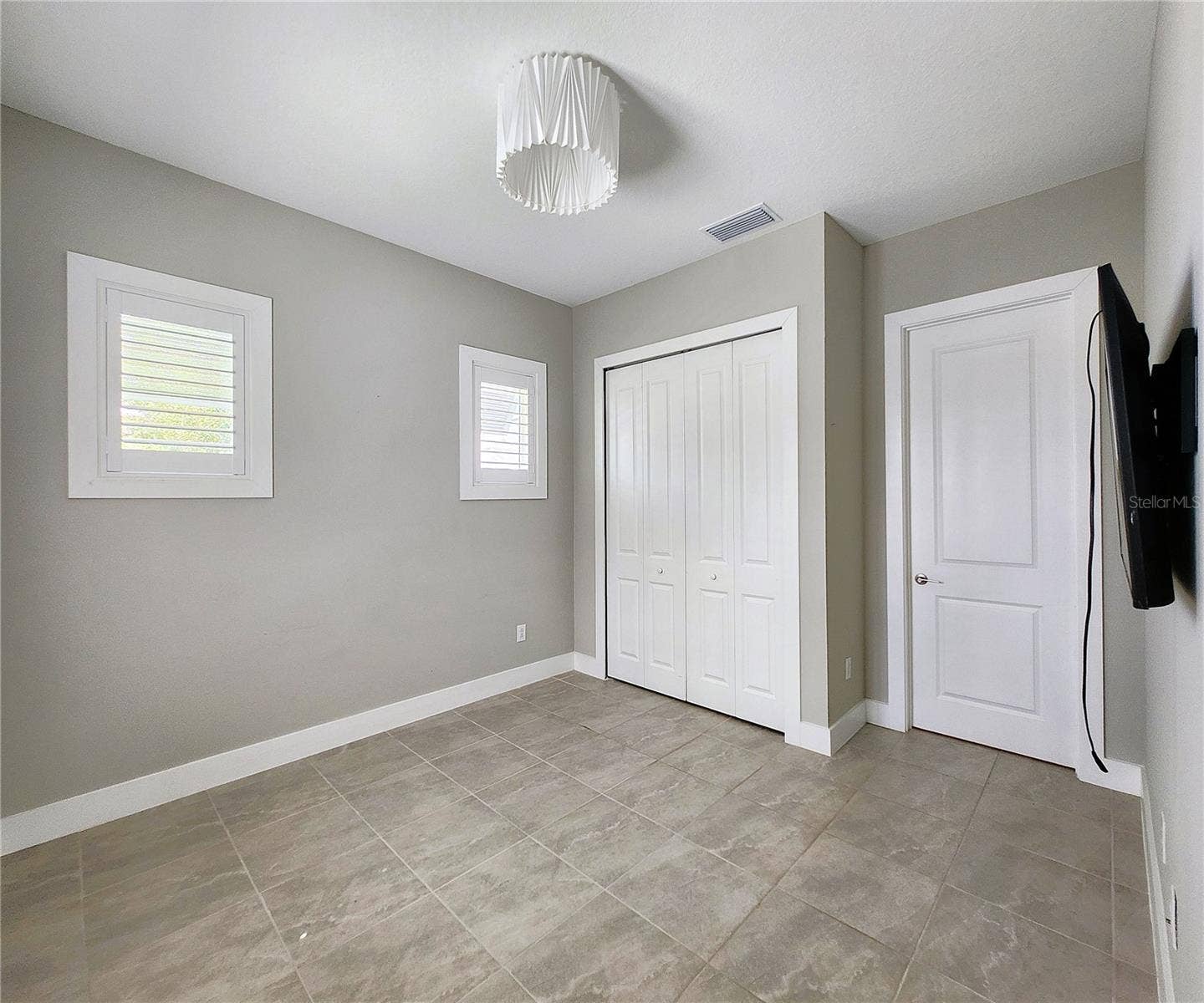 8896 DRUMMER PLANK DRIVE, Wesley Chapel, FL 33545 Guest House measures approximately 20x23, includes 1 bedroom, 1 full bathroom, living room, impact glass sliders with remote controlled shades.