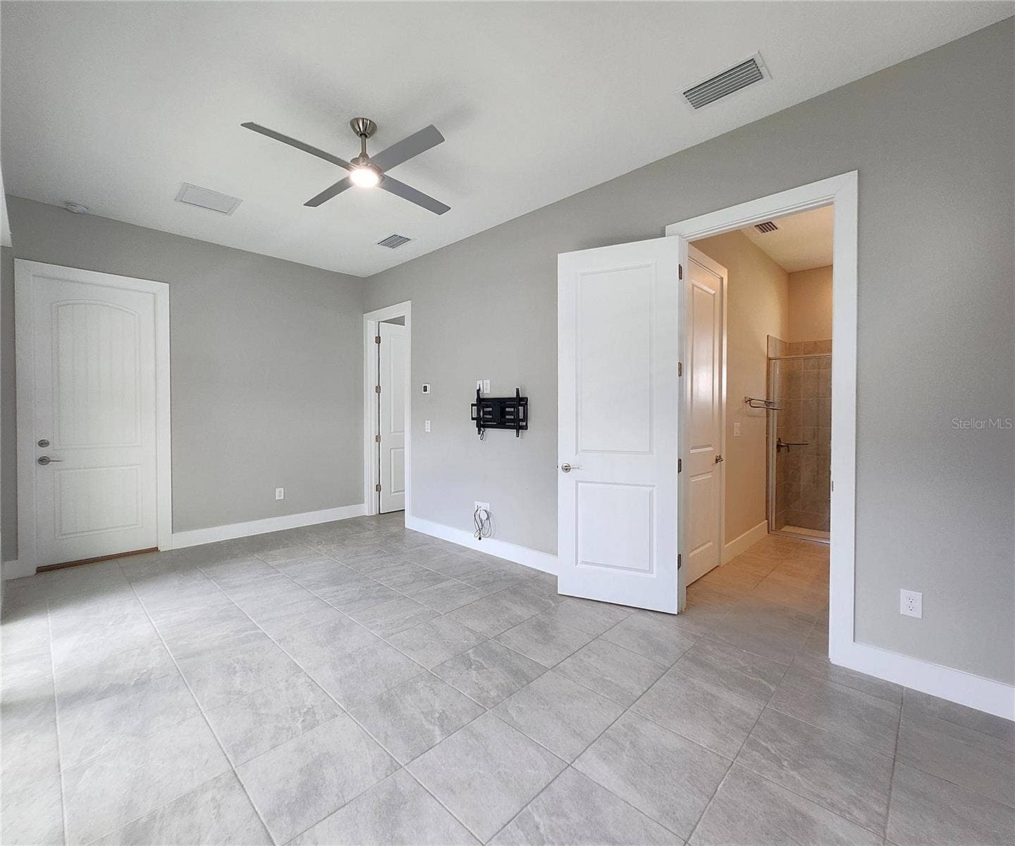 8896 DRUMMER PLANK DRIVE, Wesley Chapel, FL 33545 Guest House measures approximately 20x23, includes 1 bedroom, 1 full bathroom, living room, impact glass sliders with remote controlled shades.