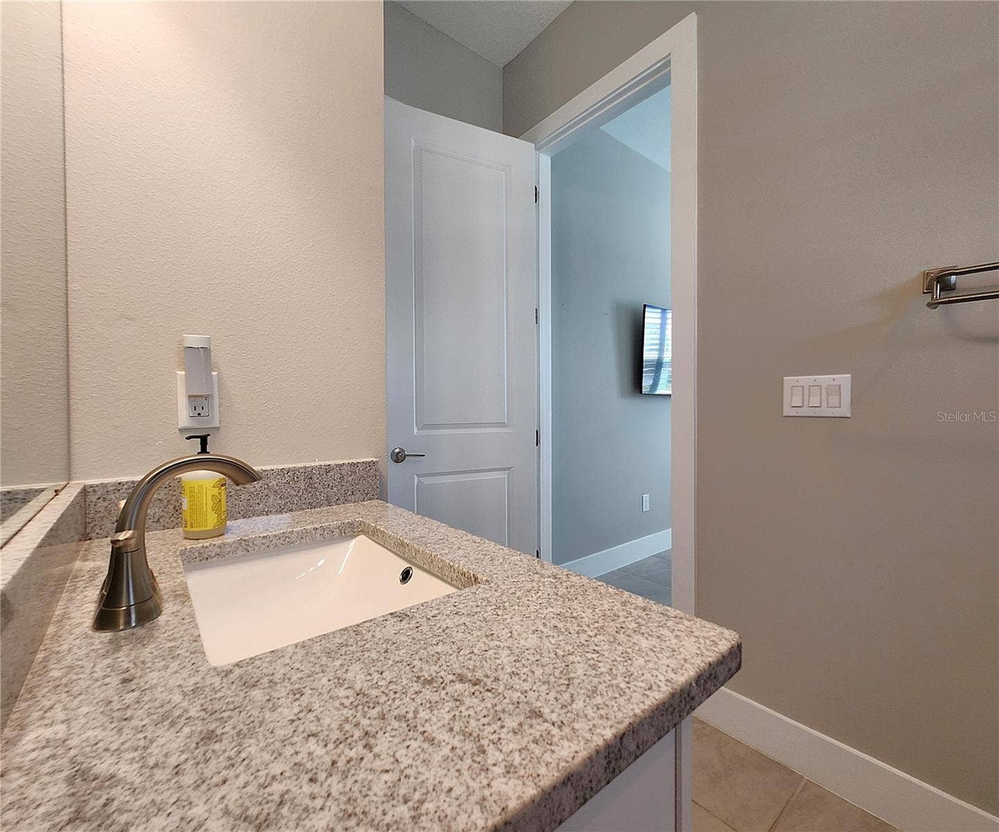 8896 DRUMMER PLANK DRIVE, Wesley Chapel, FL 33545 Guest House measures approximately 20x23, includes 1 bedroom, 1 full bathroom, living room, impact glass sliders with remote controlled shades.