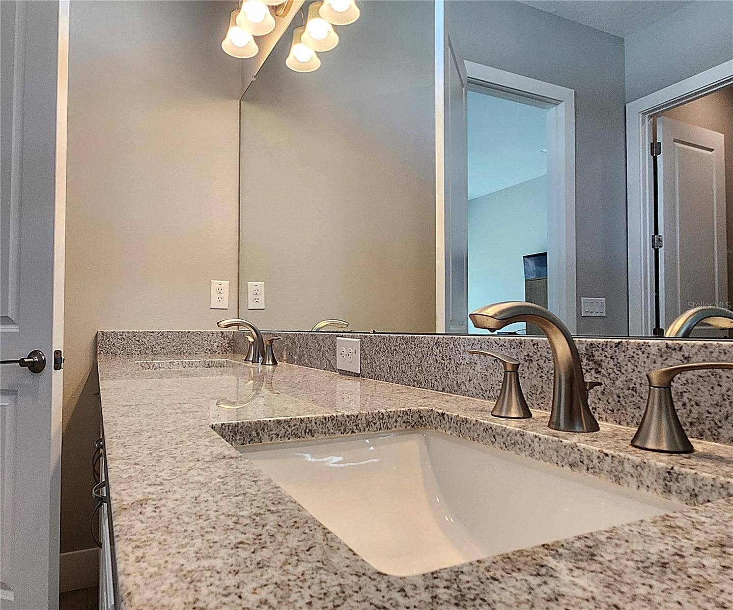 8896 DRUMMER PLANK DRIVE, Wesley Chapel, FL 33545 Master bathroom includes large walk-in tiled shower, water closet, walk-in closet, dual sink vanity, granite countertops