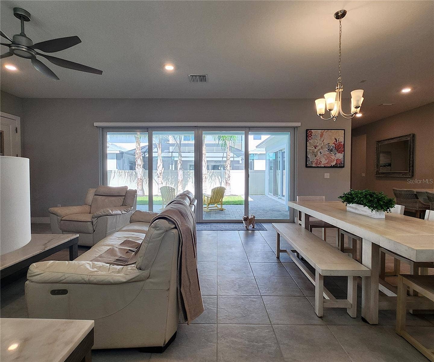 8896 DRUMMER PLANK DRIVE, Wesley Chapel, FL 33545 Main home: plantation shutters, remote controlled shade, large living room, dining area, large open kitchen, 3 bedrooms, 2 full bathrooms, 1 guest bathroom, interior laundry room